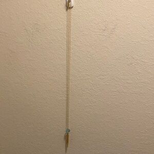 Beautiful Touchstone Crystal by Swarovski tassel necklace.